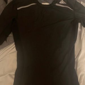 Adidas size medium compression shirt.